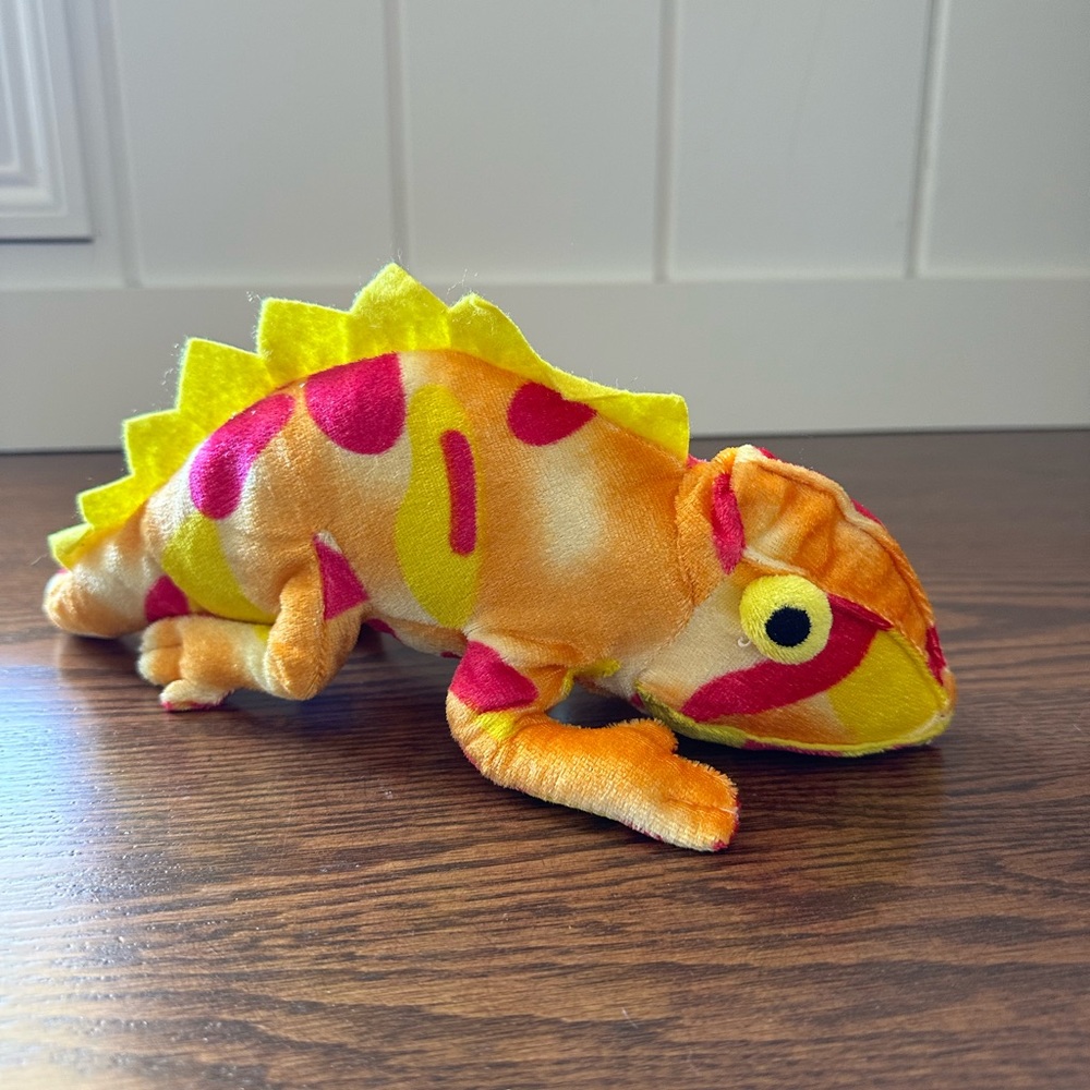 Multi colored chameleon toy plush B.J. toys. 
Measures approximately 11”